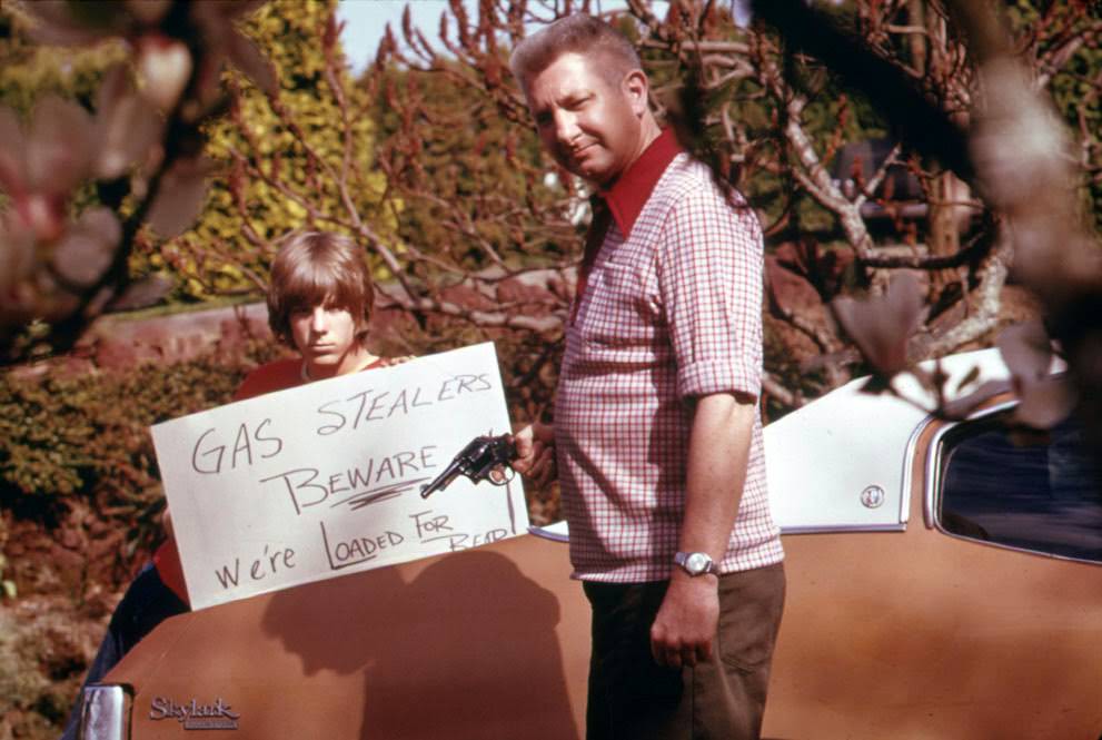 #12 A Portland father and son made a sign warning thieves of the possible consequences of stealing gas, 1974.