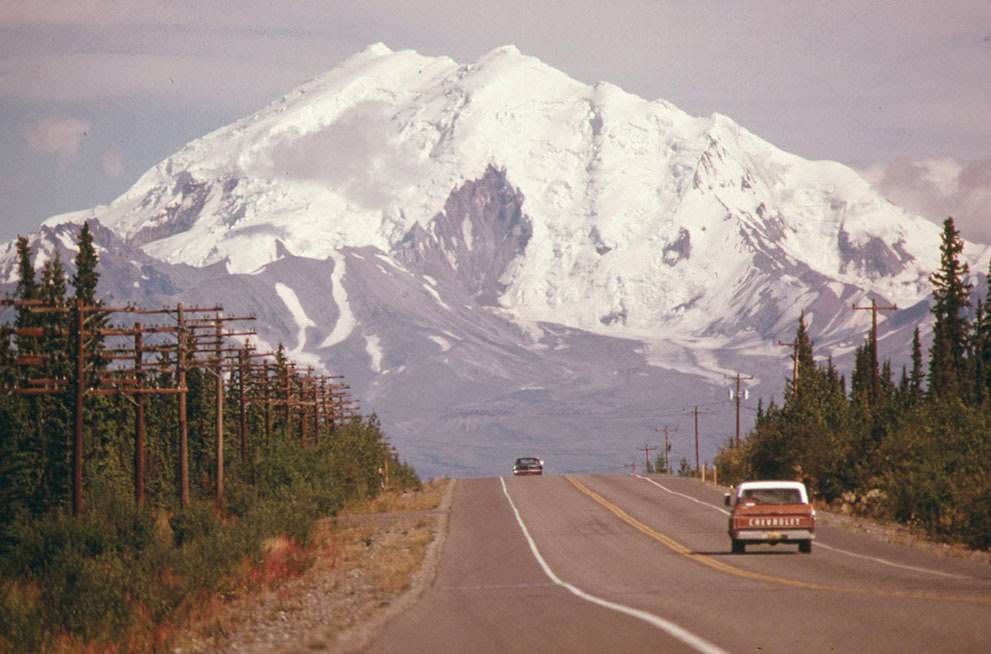 #2 Looking east along Alaska’s Glen Highway, toward Mount Drum at the intersection of the highway and the under-construction Trans-Alaska Pipeline, 1974.