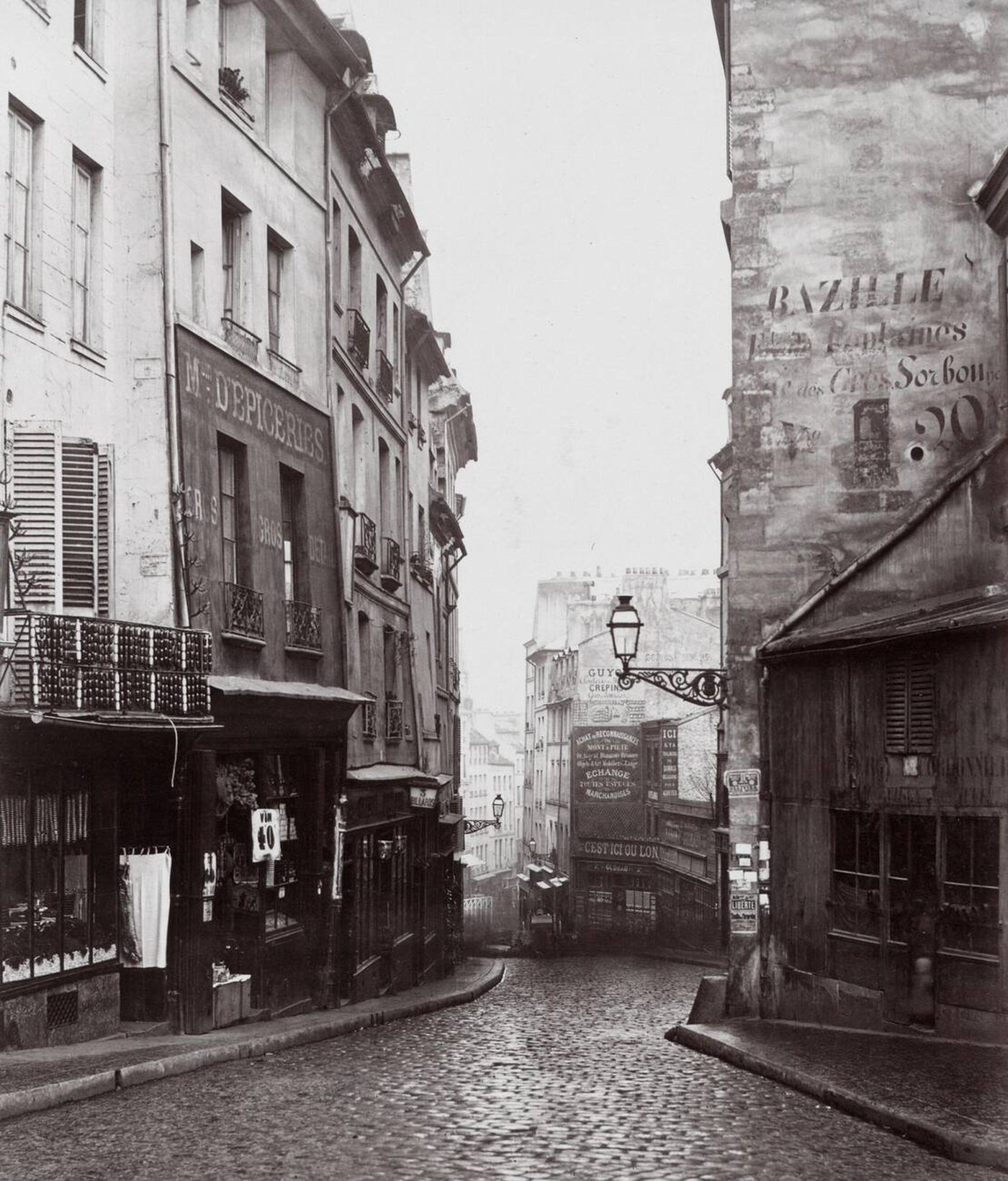 #27 Rue de la Montagne-Sainte-Geneviève near the intersection of Rue LaPlace, Paris, 1860s.