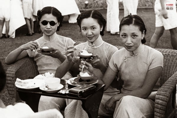 #9 Apart from films, sports competitions and the like had also become a pursuit of high society. They never tired of tennis, horse racing and similar sports. Quite a few foreigners established jockey clubs and such organizations here [in Shanghai]. Photo is of three sisters awaiting the start of a tennis match. .