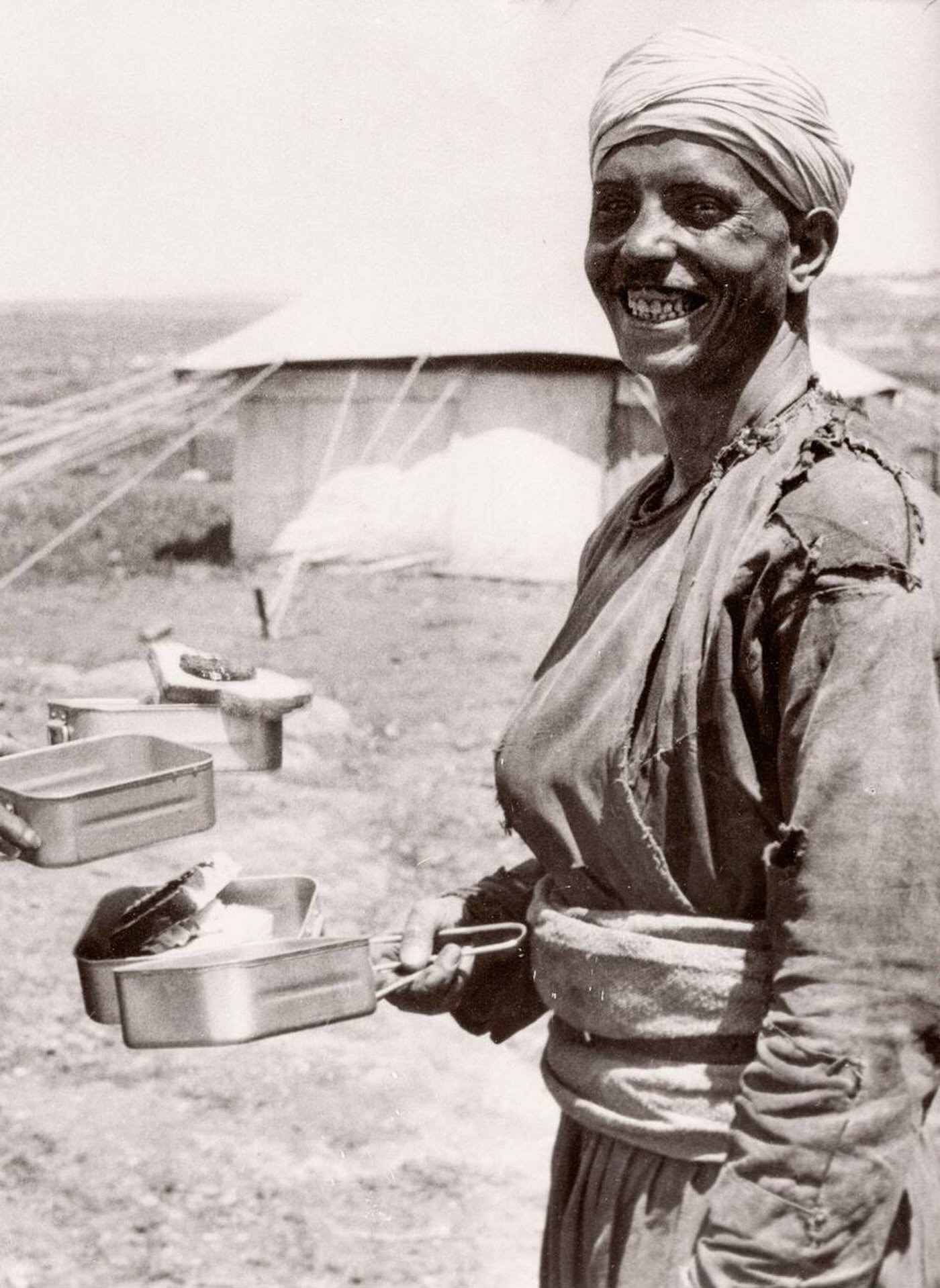 #64 British army recruit with rations in Aleppo, Syria, 1943.