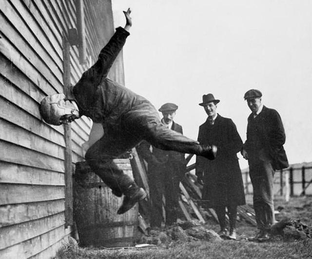 Testing a new prototype for a football helmet, 1912.