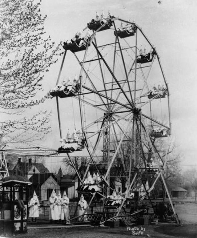 The Ku Klux Klan attending a carnival in Canon City, 1925.