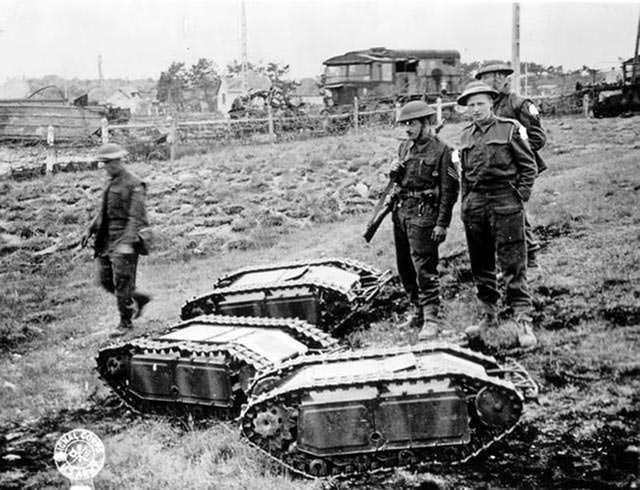 British soldiers with captured German Goliath tank busters, c. 1939-1945.