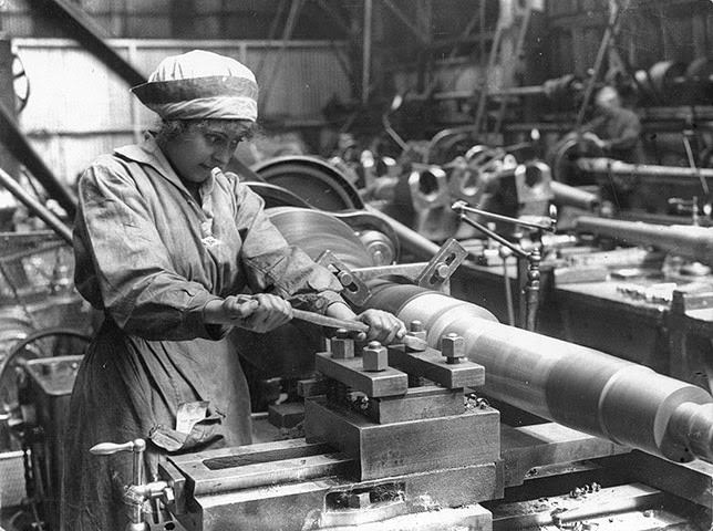 A woman at work in an armaments factory during the First World War.