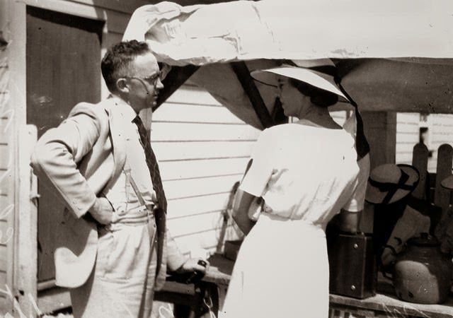 Mr K.J. Morris, the U.A.P. candidate for Ithaca, talks to a voter during the Queensland State Election of 1938