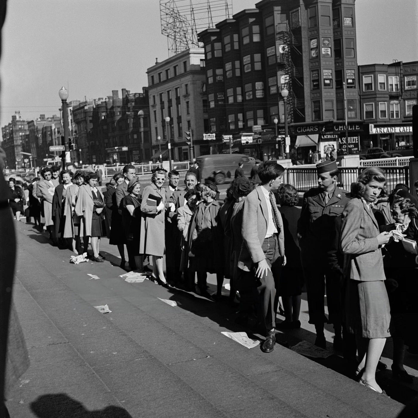 #41 A queue on the street outside Symphony Hall in Boston, 1948.