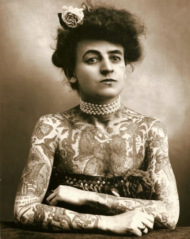#11 Maud Wagner, the first well know female tattooist in the United States, 1907.