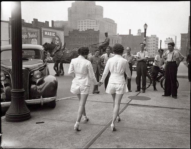 #7 Two women show uncovered legs in public for the first time in Toronto, 1937.