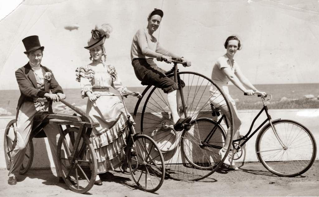 These wheels and many others took part in a huge parade of more than 6,000 cyclists celebrating Bicycle Day at the Chicago World’s Fair; pictured left to right are Robert Van Deventer, Helen Trudel, Allen Blair from the cast of Wings of A Century, and Louise Lindsay from the Cycle Trades of America exhibit, 1934.