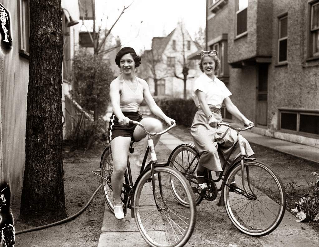 Ray and Geraldine Hudson, dancers known as “The Hudson Wonders” at the Bon-Air Country Club, on their bikes, 1937.