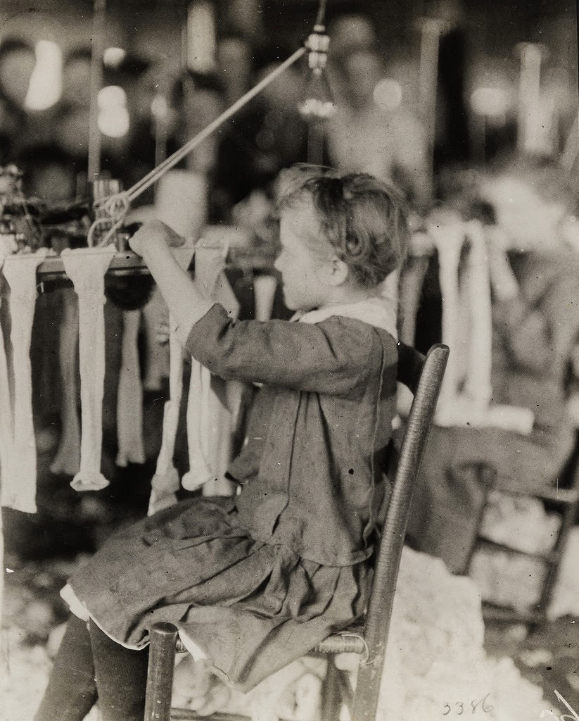 #3 Young girl working at a knittingmachine at Cherokee Hosiery Mill. Rome i Georgia, USA 1913.