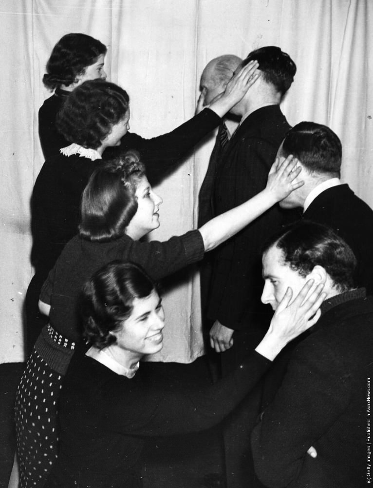 #21 Four students at a Liverpool drama school enjoy a lesson in face-slapping, 1939.