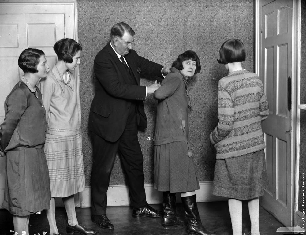 #4 Lady detectives learning their trade, with Mr. Kersey showing them how to apprehend a suspect, 1927.