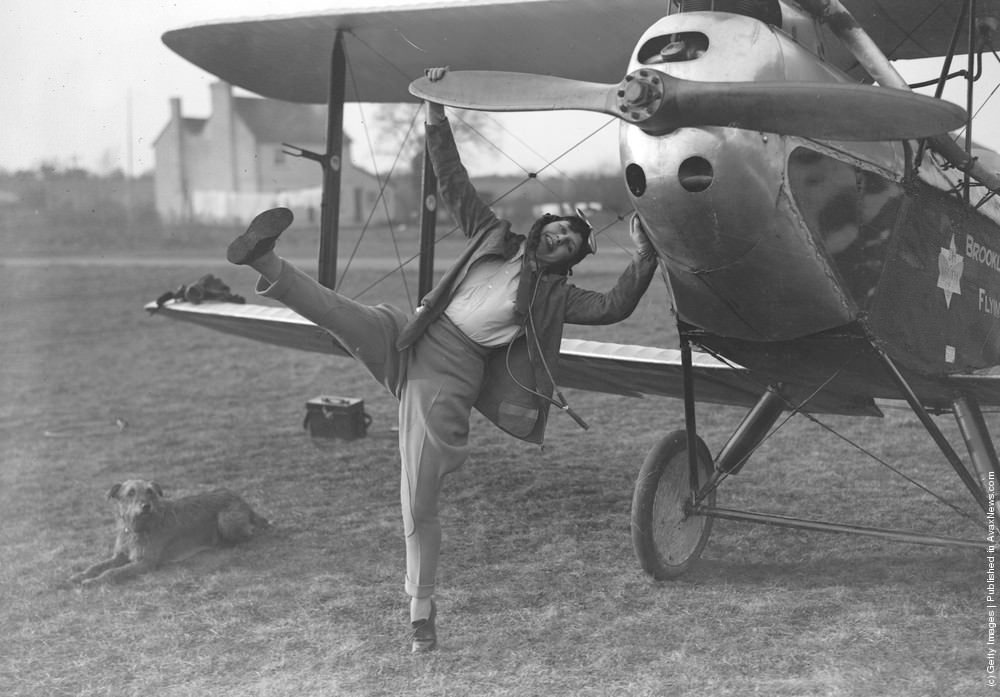 #6 A young woman taking flying lessons at Brooklands School, 1929.