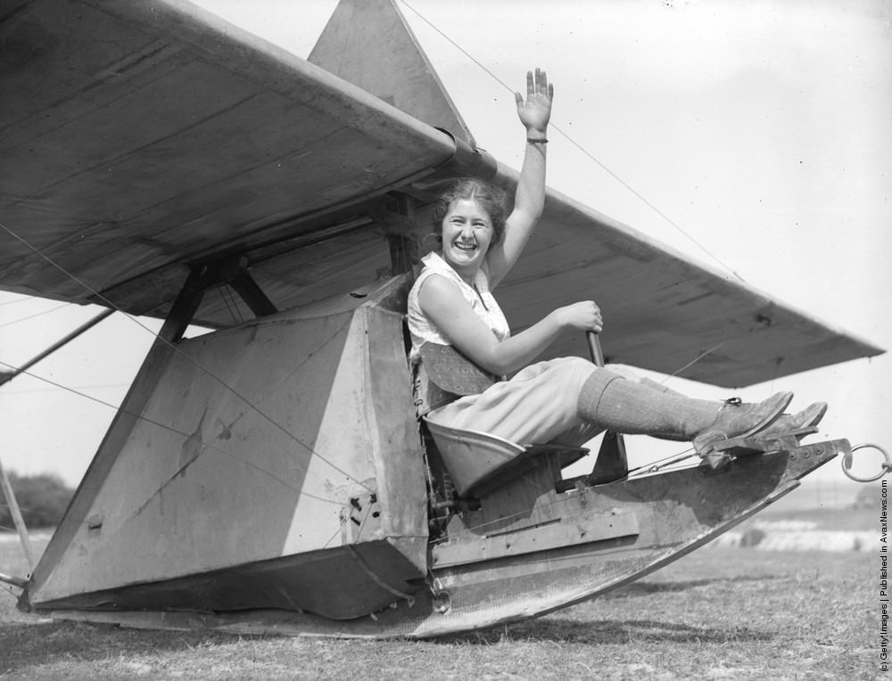 A college student prepares to try out a small glider at the London Gliding Club on Dunstable Downs, 1933.