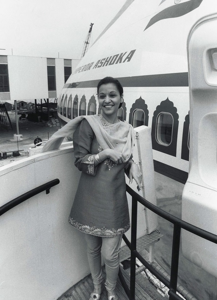 Stewardess Aban Mistry models the Air-India uniform next to the Taj Mahalian decor of an Air-India ‘Jumbo Jet’, 1971. The short salwar kameez was both culturally appropriate and practical for serving in the cabin. The elegant dupatta scarf added an extra flourish.