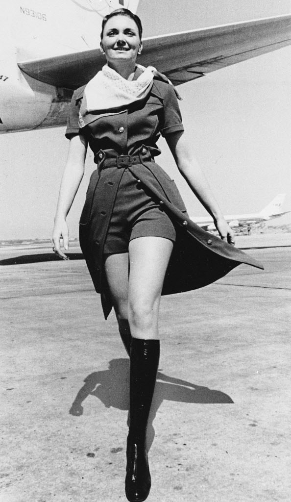 A uniform for TWA stewardesses from 1971 was made up of “mini-pants” worn with a safari shirt dress.