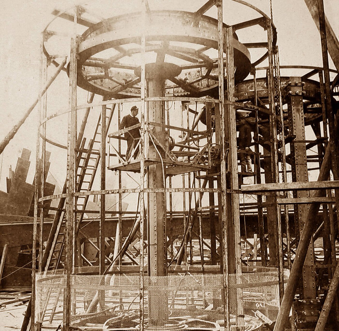 Building the Forth Railway Bridge – riveting machine, 1890.