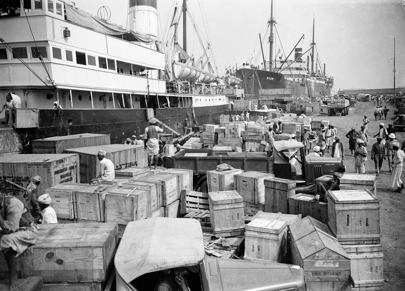 #48 The docks at Massawa piled high with all kinds of war supplies, 1935.