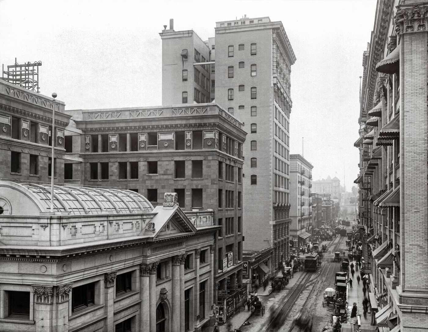 #21 Looking down Fourth Street from Main towards Spring Street, with the Farmers and Merchants Bank and the tall Hibernian Building, Los Angeles, California, 1900.