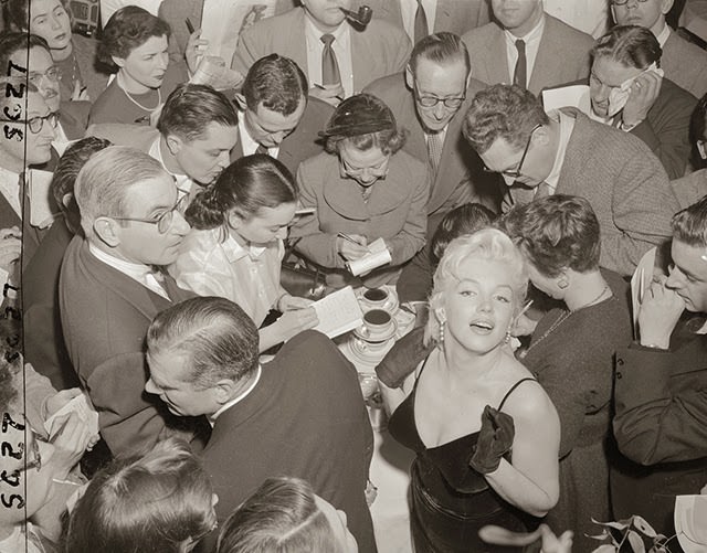 Behind the Glamour: Marilyn Monroe and Laurence Olivier at a 1956 Press Conference Celebrities