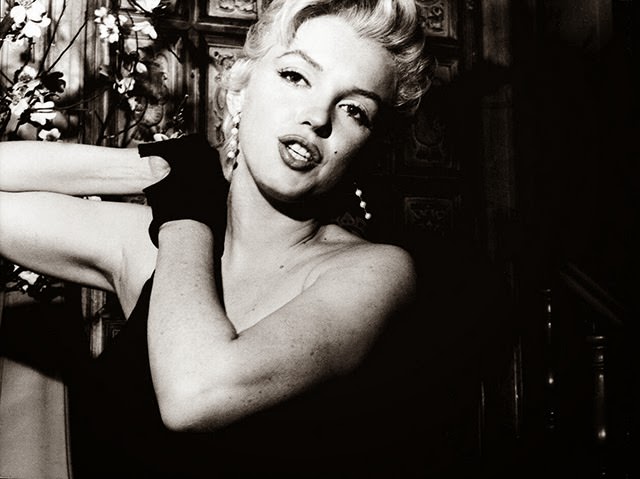 Behind the Glamour: Marilyn Monroe and Laurence Olivier at a 1956 Press Conference Celebrities