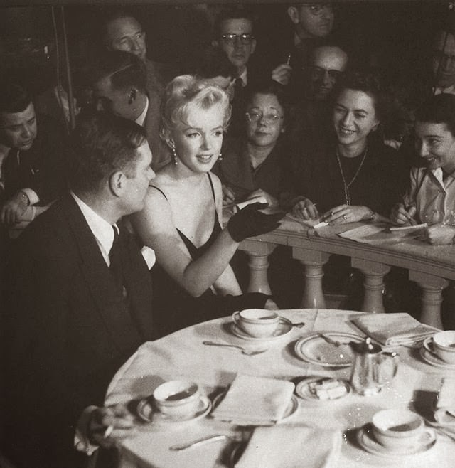 Behind the Glamour: Marilyn Monroe and Laurence Olivier at a 1956 Press Conference Celebrities