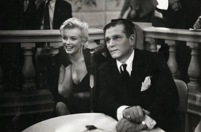 Behind the Glamour: Marilyn Monroe and Laurence Olivier at a 1956 Press Conference Celebrities