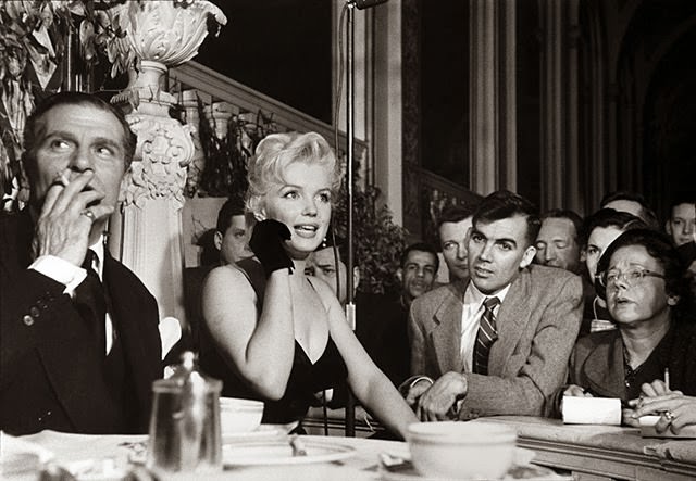 Behind the Glamour: Marilyn Monroe and Laurence Olivier at a 1956 Press Conference Celebrities