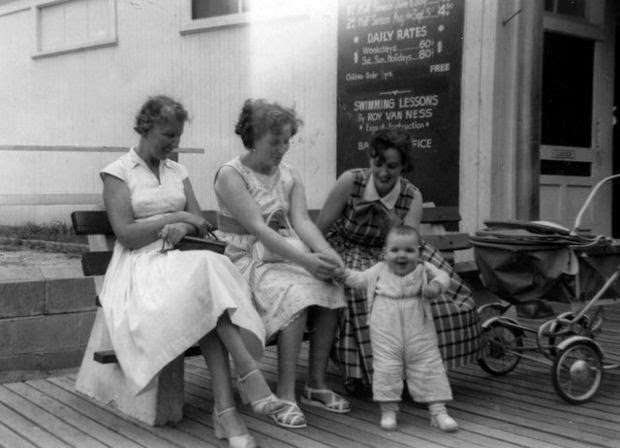 #12 A young mother and her infant at the Jersey Shore, 1968.