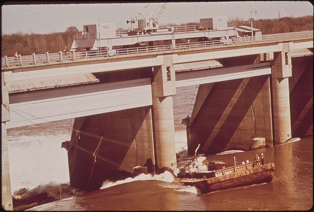 #55 A Liquid Chlorine Barge, After Breaking Loose From Its Tug Became Lodged Against The Mcalpine Dam On The Ohio River And Could Not Be Set Free, March 1972