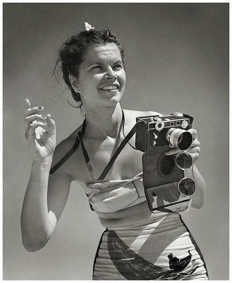 On R&;R in the 1940’s is a United States Women’s Army Corps Photographer with an Argus (Brick) camera.