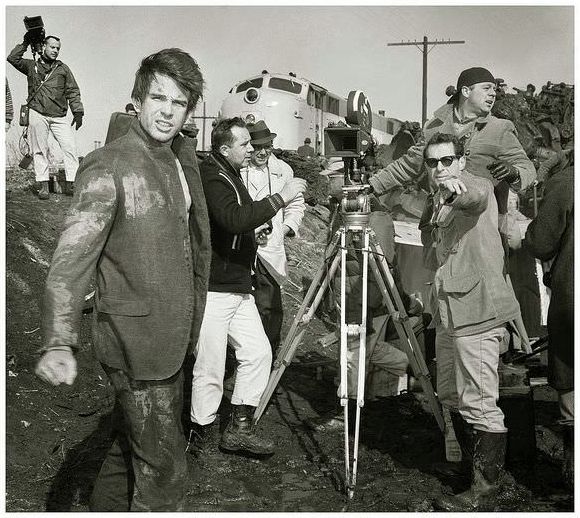 Warren Beatty filming “Mickey One”, near Chicago, in March, 1964. The producer/director, Arthur Penn, is right of the camera.