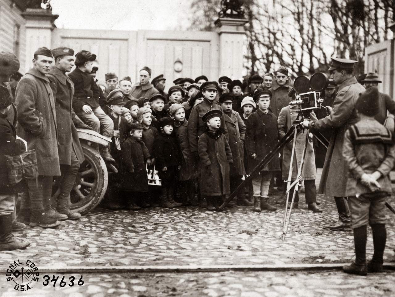 Children of Archangel forget their usual call of American-ski biscuit long enough to pose for Movie Operator, Archangel, Russia, 1918.