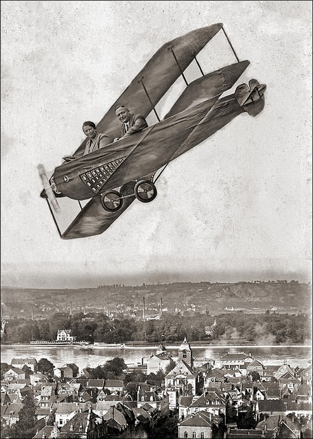 A photograph taken somewhere at the river Rhine, styled “Just Like the Red Baron.”