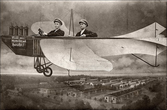 The sign reads “Escape from Munster to America” at Munsterlager, Germany, Whitsun 1914.