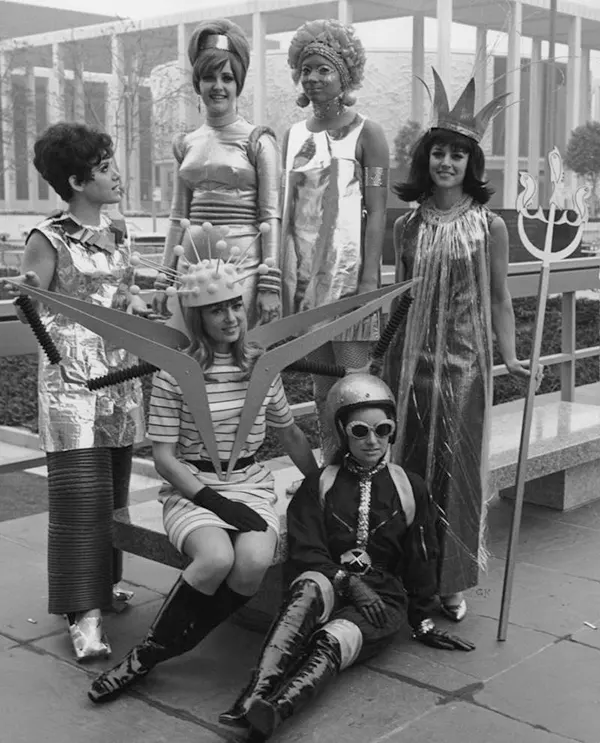 #22 Women model futuristic fashion for the year 2000 during Engineering Week, circa 1965.