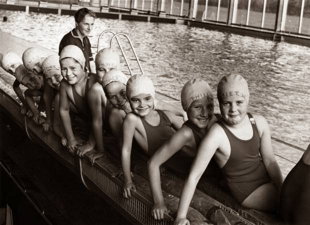 #12 These girls—pupils at the Virgo Fidelis Convent School—are having a swimming lesson at Crystal Palace Recreation Centre on October 2, 1967.