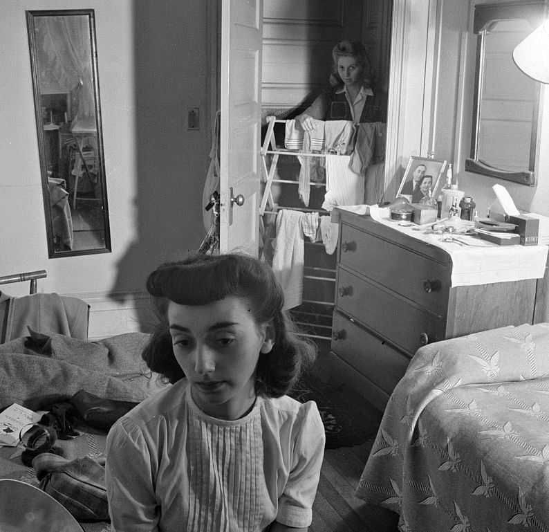 #2 Girl in the doorway of her room at a boardinghouse