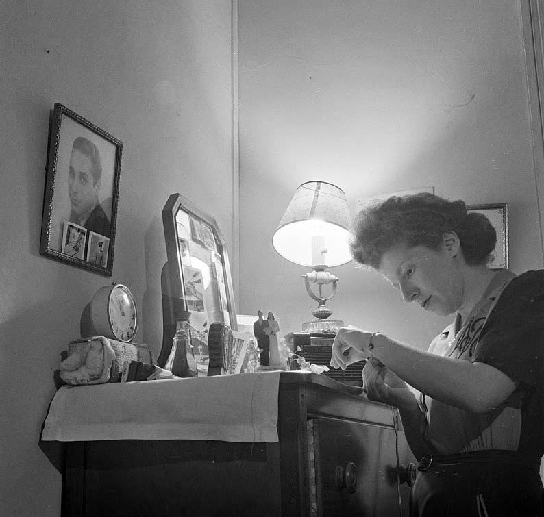 #7 This girl met her husband at the boardinghouse. When he was drafted, she moved back into her old room. His pictures decorate the dresser and wall