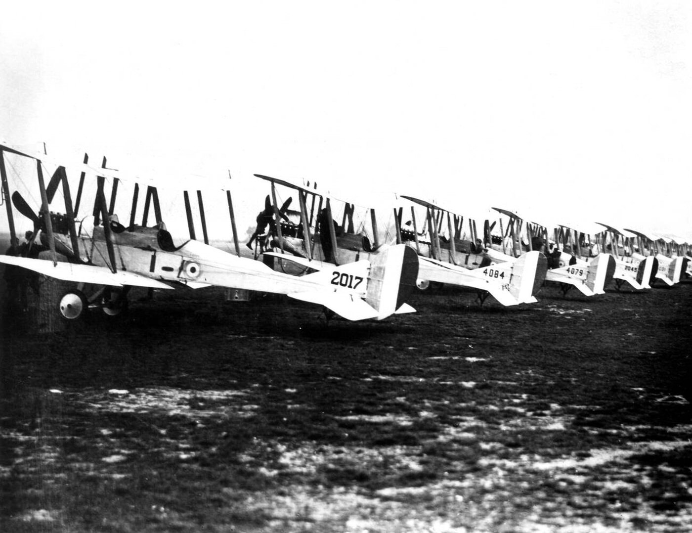 #94 A line of BE2c planes of No.13 squadron at Gosport, Hampshire, England, waiting to take off for duty in France, 1915.